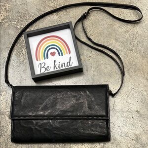 Black Crossbody Bag with Sleek Design and Versatile Strap